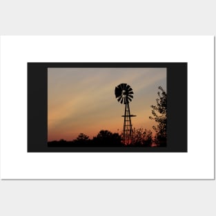 Windmill silhouette with a colorful Sunset Smokey sky Posters and Art